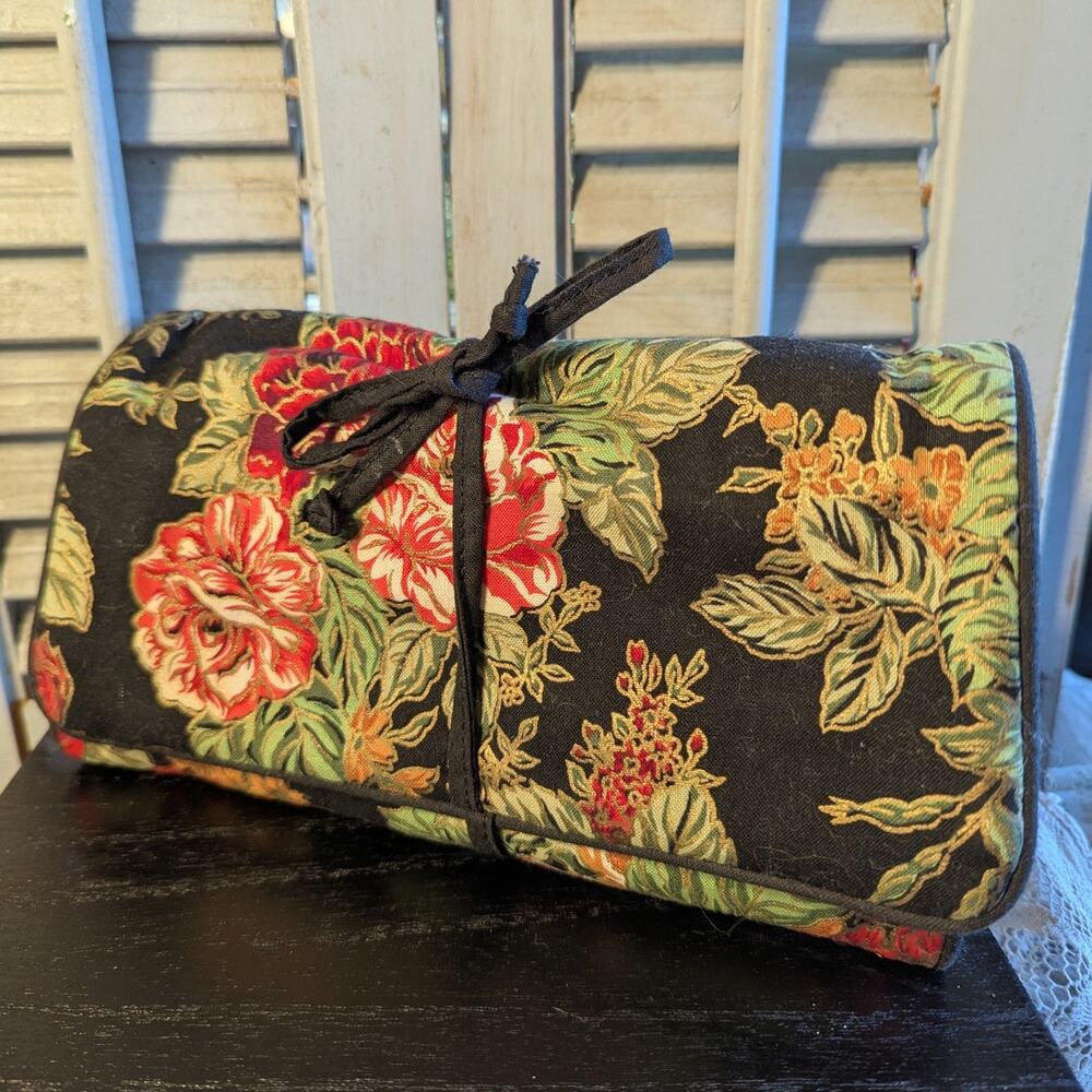 Travel roll-up vintage jewelry bag with floral tapestry and gold embellishments